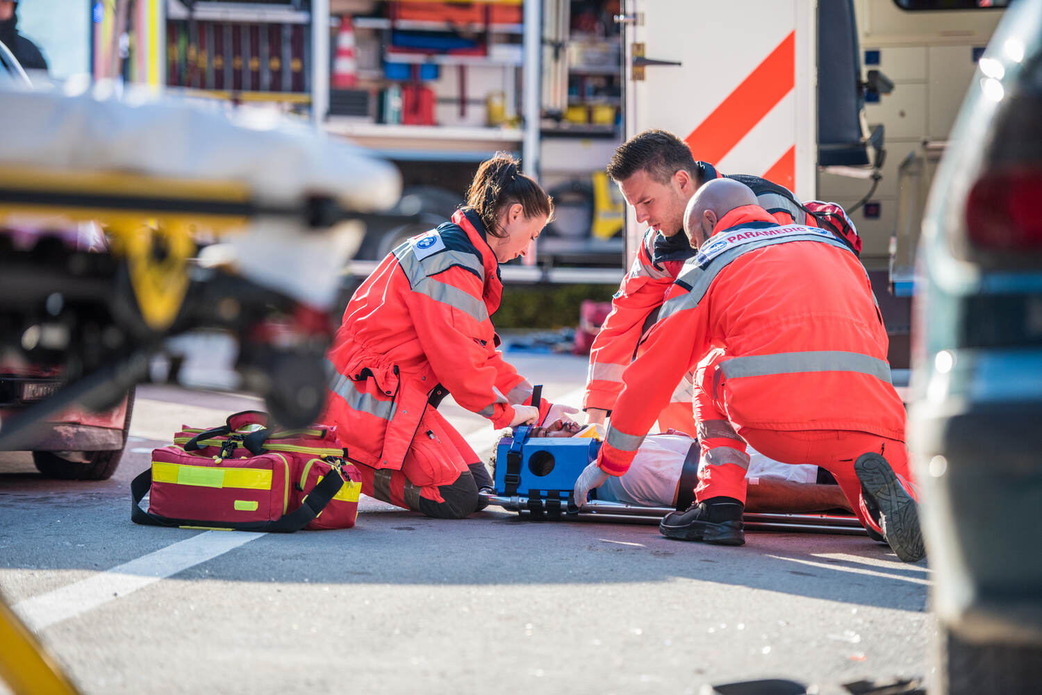 Paramedics at work performing first aid