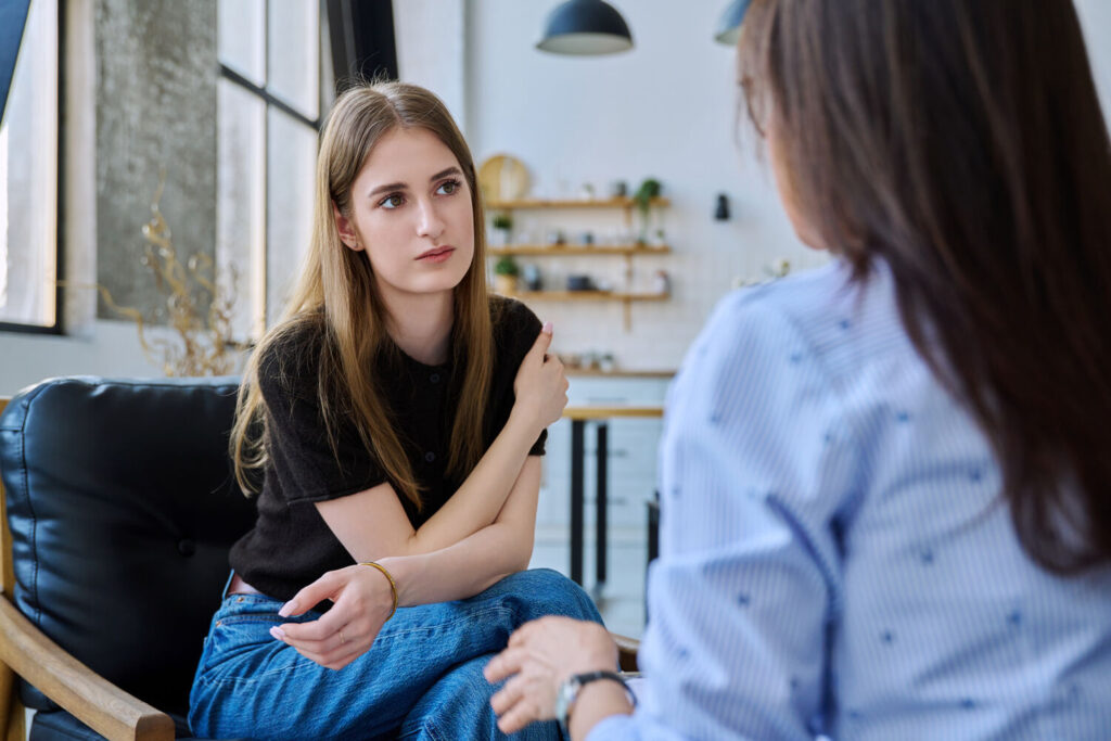 lady with anxiety issues talking with her friend
