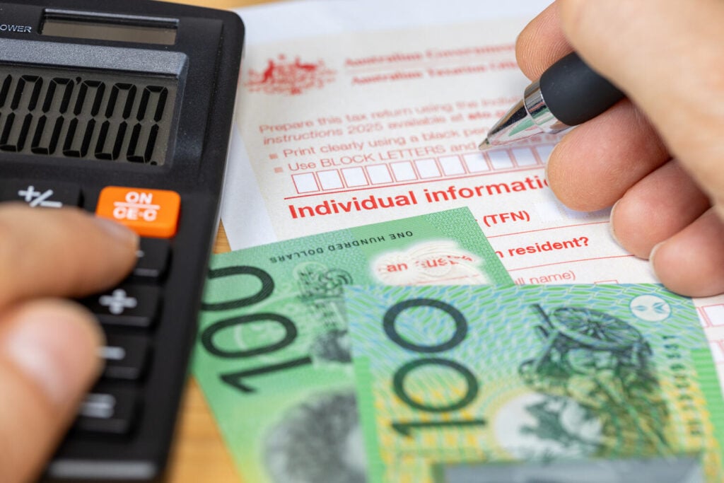 person filling tax form in Australia and including first aid training